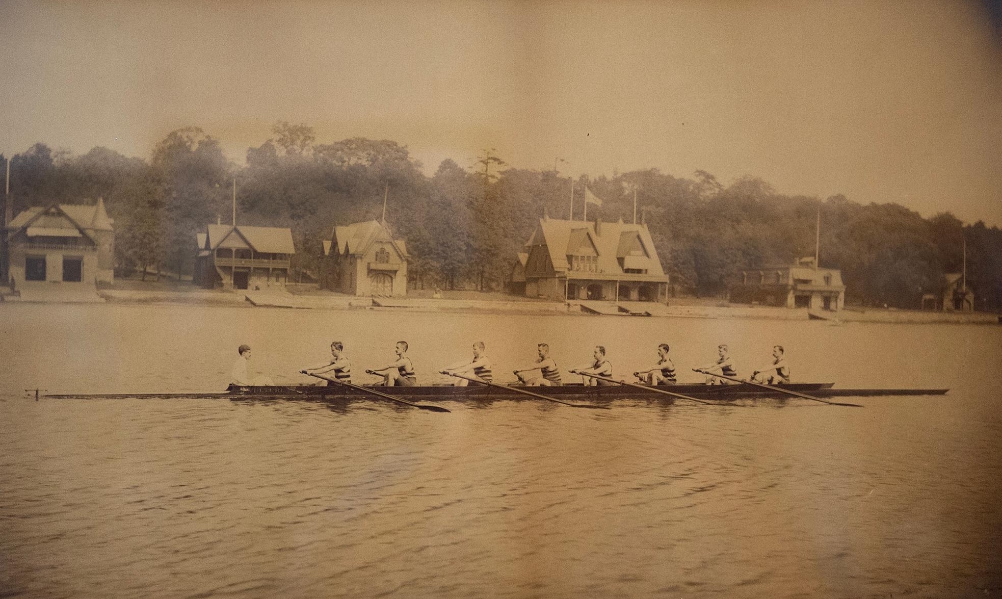 The combined Malta Vesper boathouse is seen here in June 1892 between Undine on the left and Bachelors to the right.